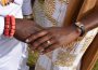 couple holding hands at ghanaian and nigerian engagement